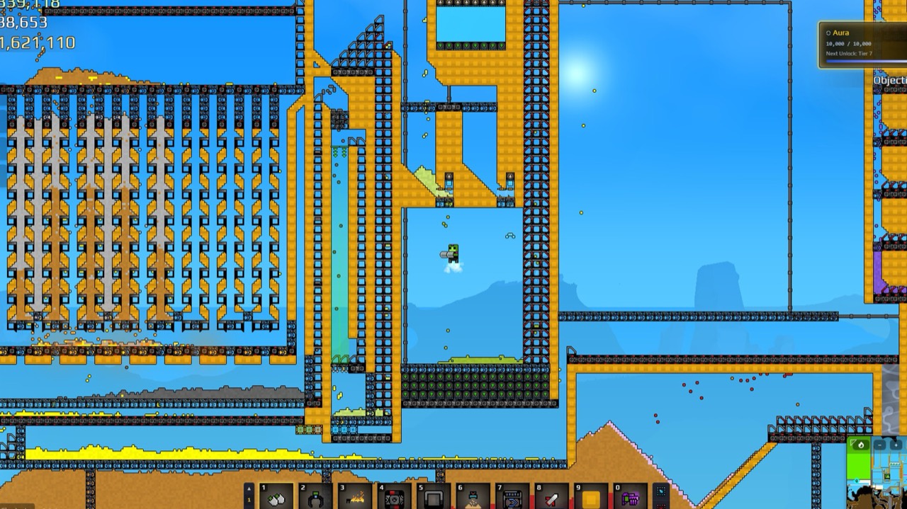 A large Sandustry factory under a blue sky: banks of vertical machines on the left, a water tank above, and conveyor lines running across the whole screen.