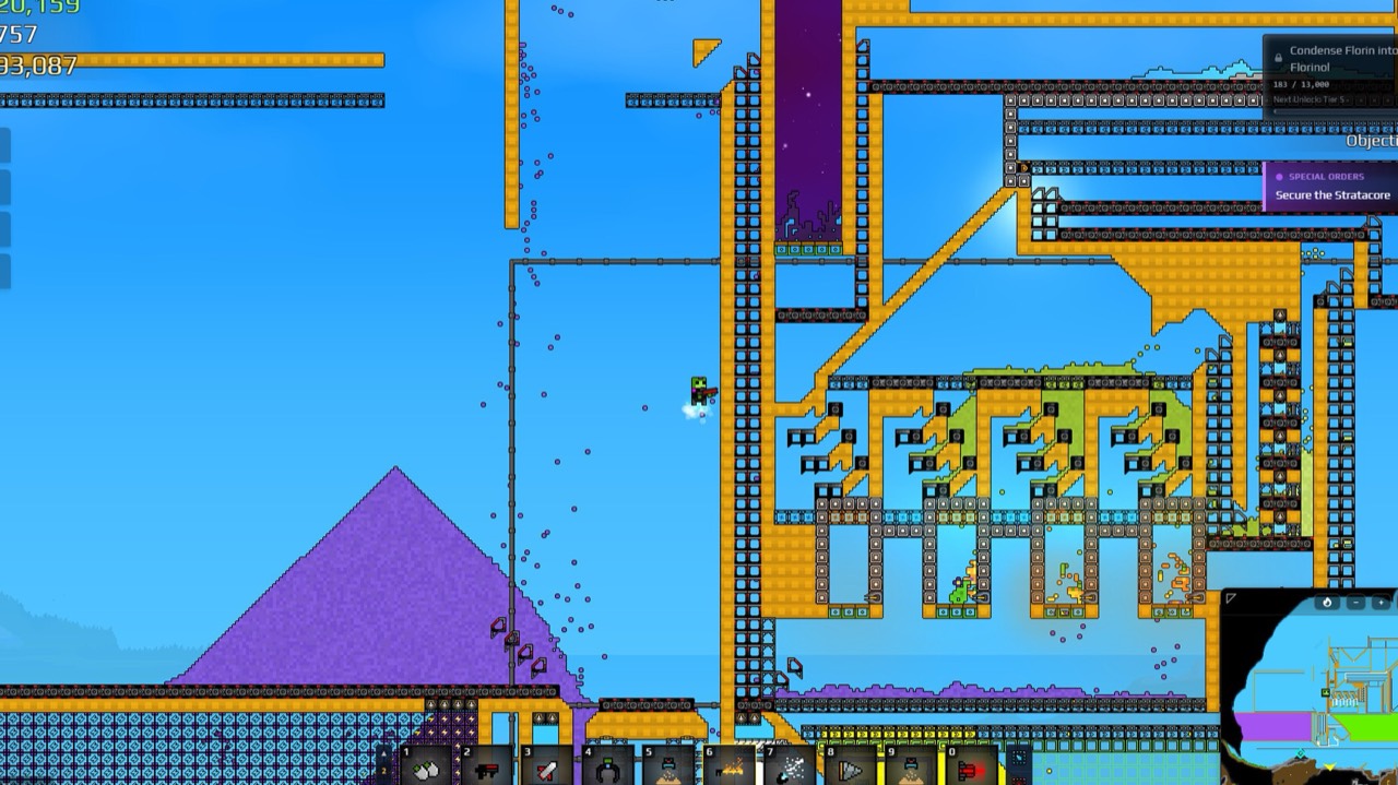 A Sandustry processing line under a blue sky, with rows of machines feeding conveyor belts that run off in several directions.